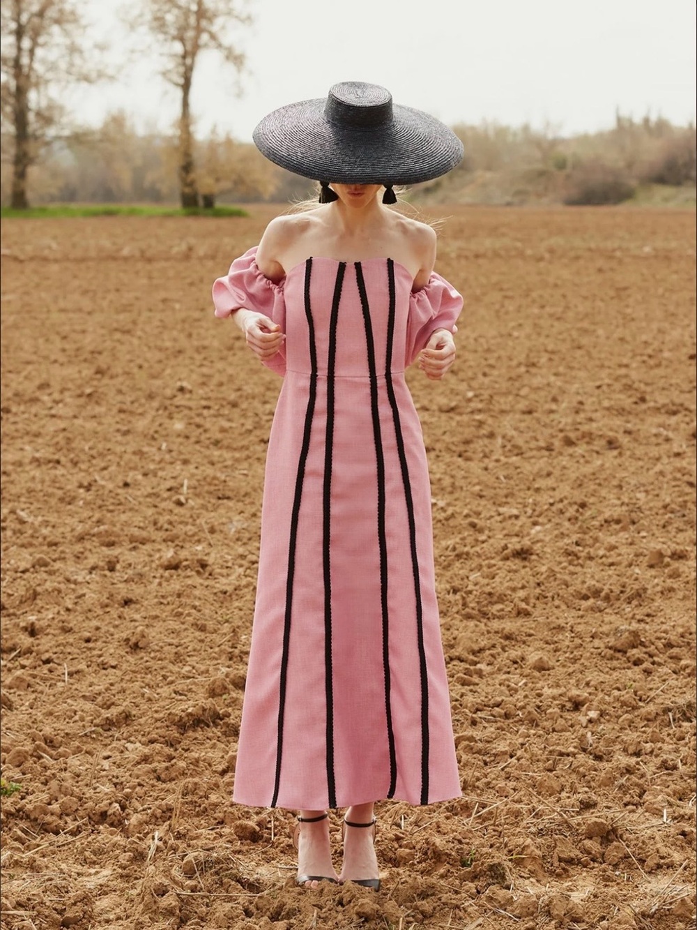 Strapless Pink Column Dress with Black Vertical Trim and snatched waist
